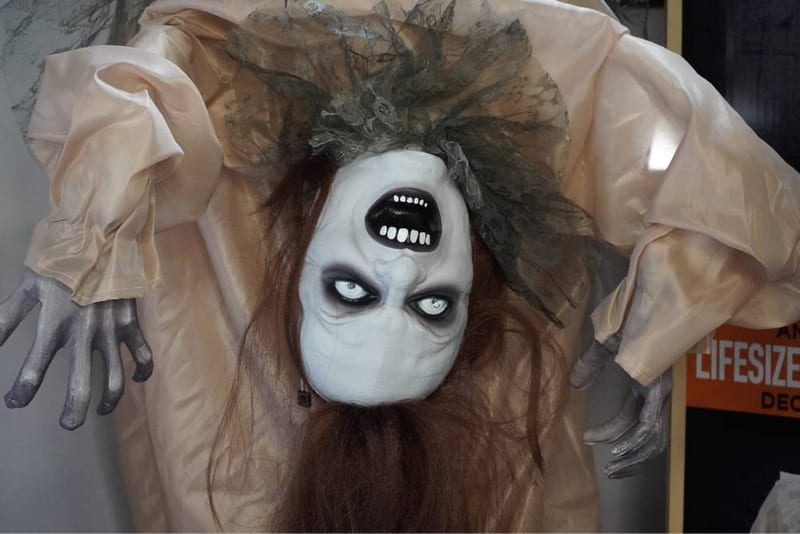 Upstairs Halloween section at Brookside Party Warehouse showing costume displays and decor.